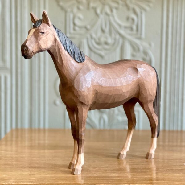 Carved riding horse